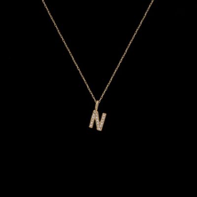 Colgante Petite de oro Letra