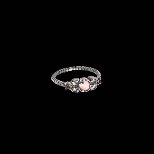 Anillo Enigma de plata y cuarzo rosa Hechizo